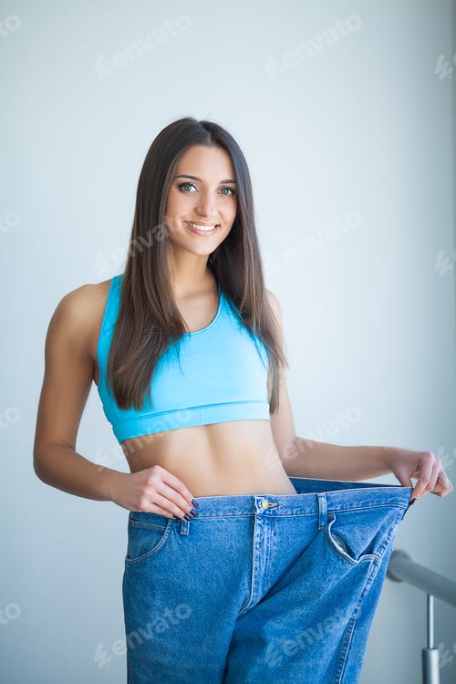Preview: Beautiful Sporty Woman Showing How Much Weight She Lost