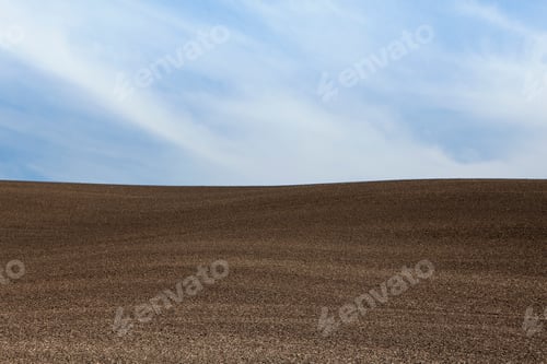 Preview: A ploughed field, and rolling landscape.