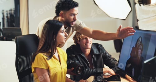 Preview: People, computer and planning for photography in studio for production results, talking and review.