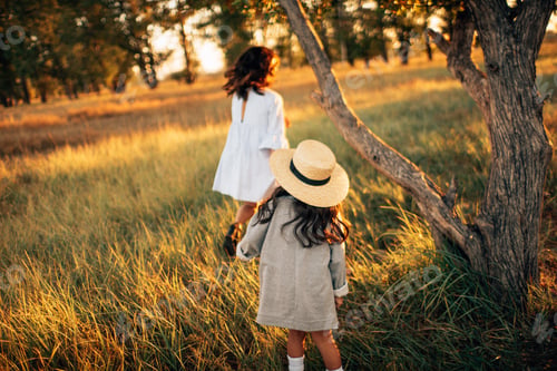 Preview: Dauther and mother. autumn walk