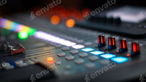 Preview: Selective focus shot of a music board mixer
