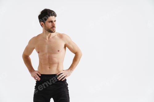 Preview: Shirtless athletic sportsman posing and looking aside