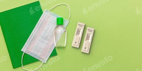 Preview: Coronavirus spread prevention measure at school. Rapid test, mask, disinfection gel and stationery