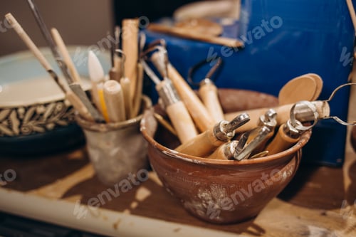 Preview: Hands together make ceramics pregnant girl with a man.