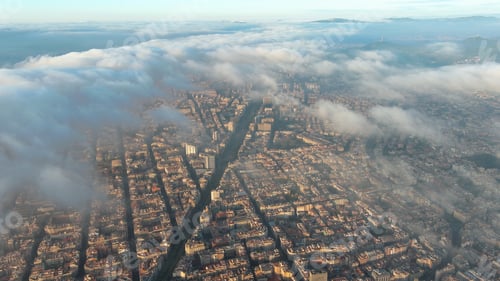 Preview: Aerial view of Barcelona City above the clouds and fog, Catalonia, Spain