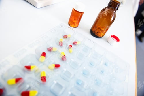 Preview: Pills laid out on desk