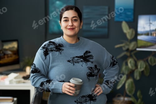Preview: Businesswoman With Coffee Working In Office