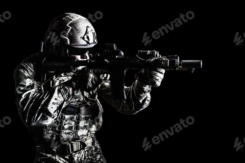 Soldier in Camouflage Aiming Rifle at Target