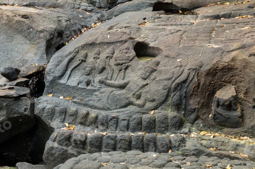 Preview: Closeup Vishnu reclining on Kbal Spean in summer season,Angkor temple area, Cambodia