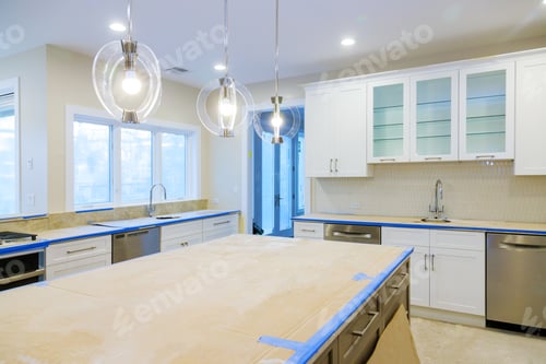 Preview: White of kitchen wooden cabinets with contemporary look of installation base for island in center