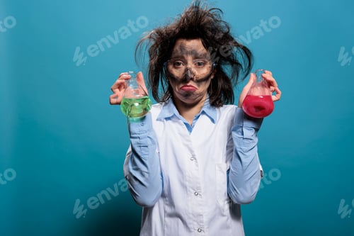 Preview: Sad lunatic chemist holding glass flasks filled with unidentified toxic chemical compounds.