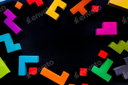 Preview: Different colorful shapes wooden blocks on black background, flat lay.