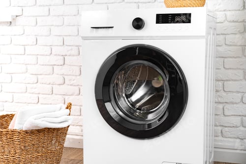 Preview: Washing machine and basket in a laundry room