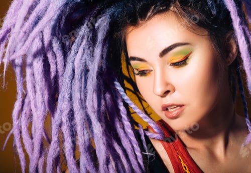 Preview: portrait woman with violet dreadlocks and colored makeup. Style, hairstyles and makeup