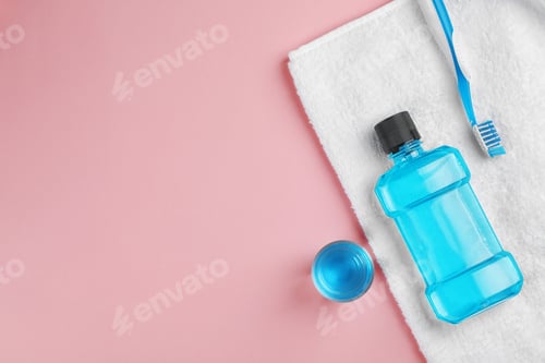 Preview: Flat lay composition with oral care products and space for text on color background. Teeth hygiene
