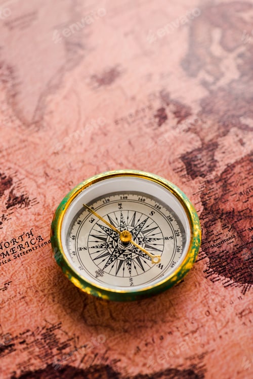 Preview: top view of golden compass on map
