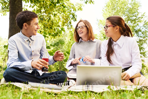 Preview: Group of Children Enjoying Picnic Outdoors