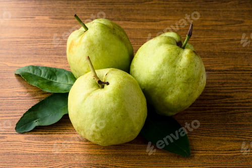 Preview: Fresh guava fruit on wooden table background.