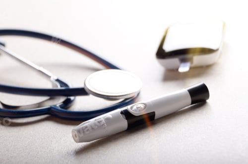 Preview: Personal blood glucose meter and lancet with stethoscope on the