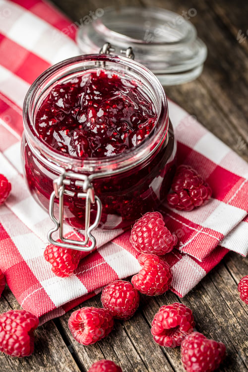 Preview: Sweet raspberry jam and raspberries.