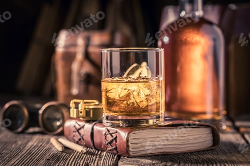 Preview: Tasty whisky with golden bottle and cold ice