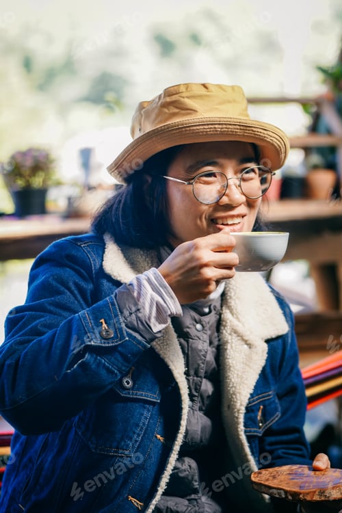 Preview: portrait of a person drinking hot coffee in the morning.