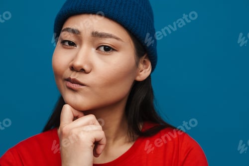 Preview: Portrait of a casual young asian woman standing