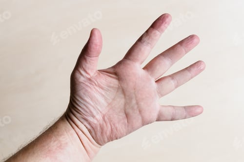Preview: male palm with spread out five fingers close up