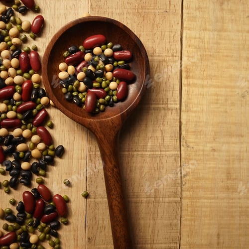Preview: Beans And A Wooden Spoon On The Old Wood Table