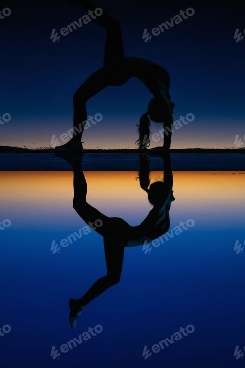 Preview: A girl doing yoga at sunset