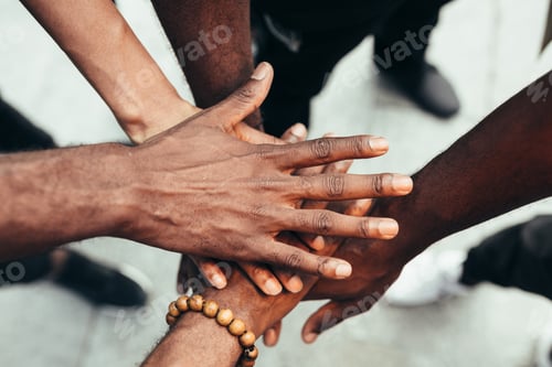 Preview: Group Of Friends Stacking Hands