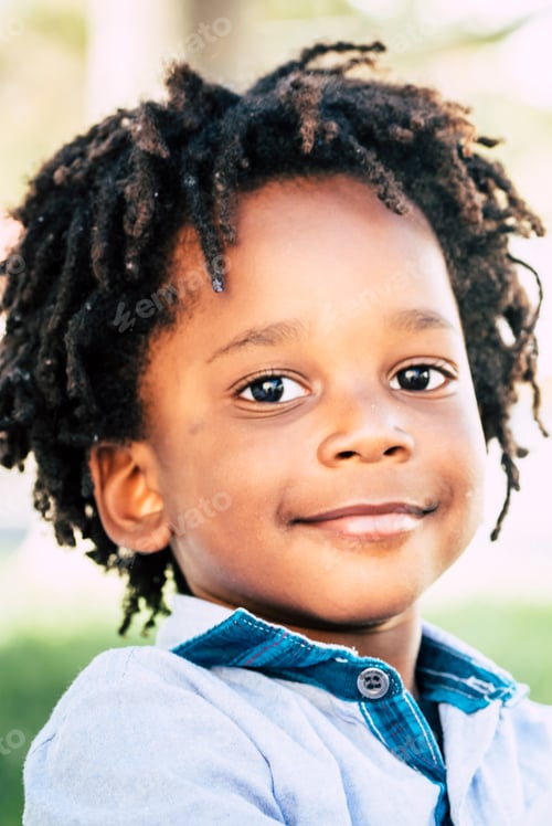 Preview: Young children black african skin play with profesisonal photo camera gear in outdoor