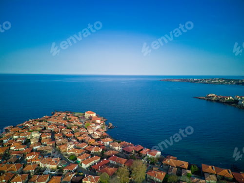 Preview: iew from a height of the city of Nessebar with houses and parks washed by the Black Sea in Bulgaria