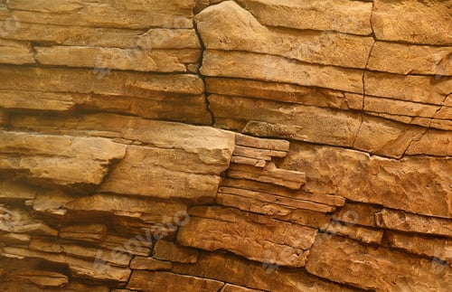 Preview: Light coarse natural rock stone background. Mining cliff rough front surface. Big limestone