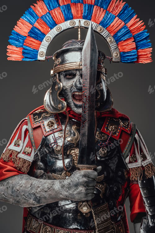 Preview: Screaming evil zombie centurion with sword isolated on gray