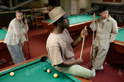 Preview: Group of people in pool club