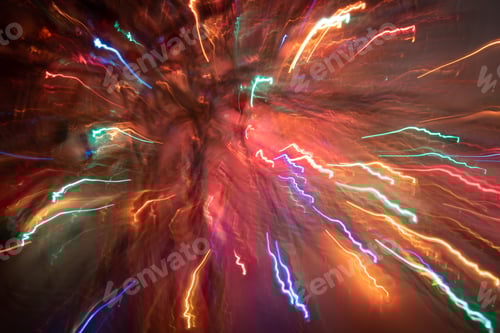 Preview: Colorful xmas blurred background with bright shiny lines of light