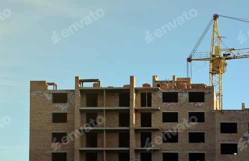Preview: View of a large construction site with buildings under construction and multi-storey