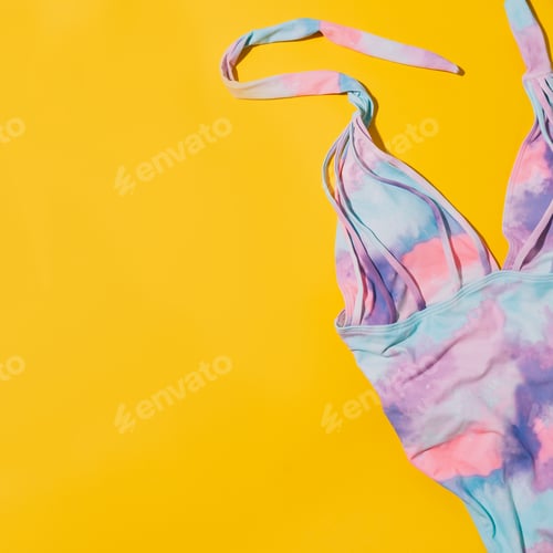 Preview: Multi-colored swimsuit on a yellow background