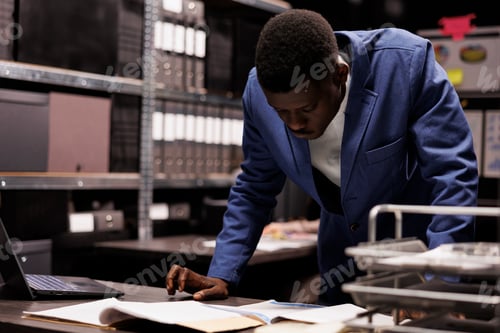 Preview: Officer reading criminology report