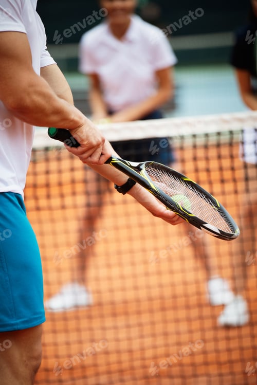 Preview: Fit happy poeple playing tennis together. Sport concept