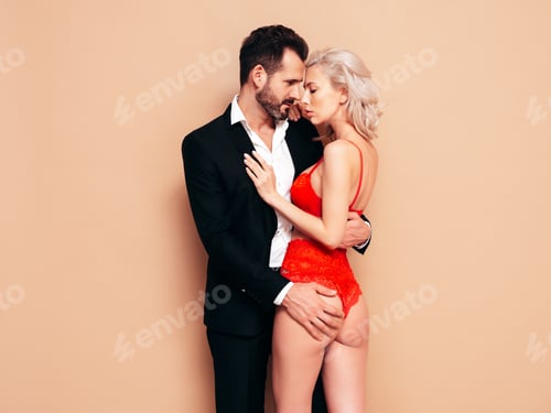 Preview: Beautiful woman and handsome man in studio