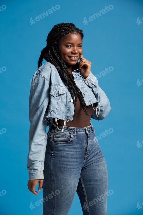 Preview: Happy ethnic plus size woman in casual outfit