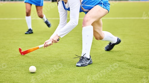 Preview: Hockey, closeup and female athlete playing a game, match or tournament on an outdoor field. Fitness