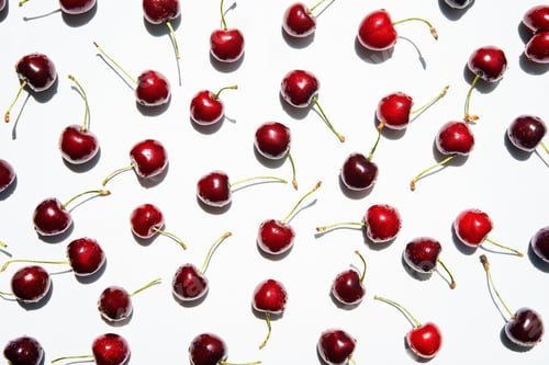 Preview: Ripe sweet cherries isolated on white background.