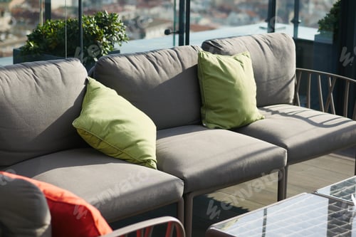 Preview: modern grey sofa with pillows in living room at home