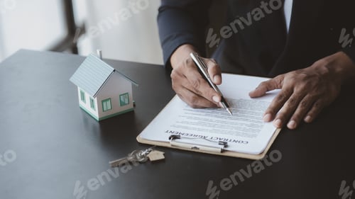 Preview: The salesperson of the housing estate in the project is preparing.