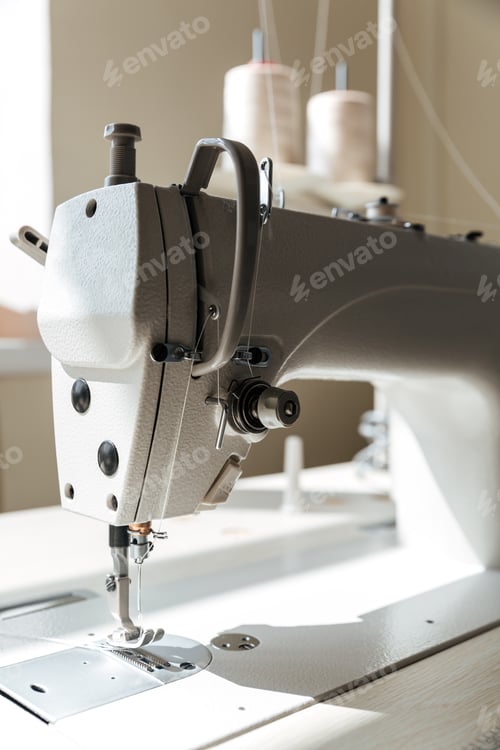 Preview: Close up of sewing machine in workshop