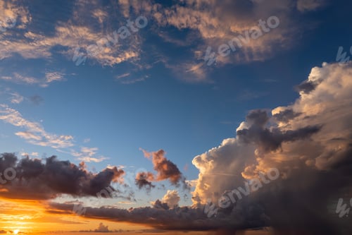 Preview: Bright colorful orange and yellow clouds on horizon