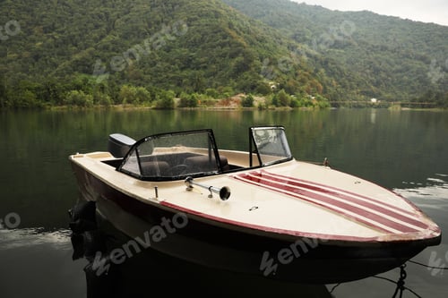 Preview: Beautiful boat on river and mountains in park